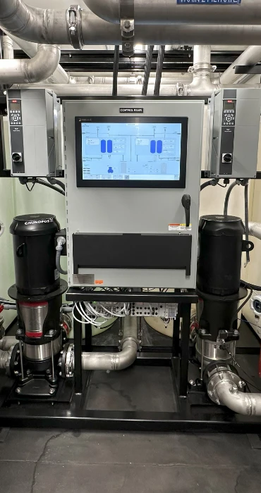 Control panel and pumps inside a mobile water treatment system